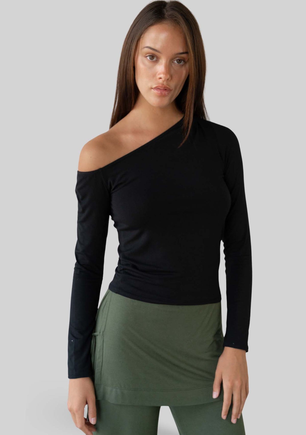 Jala Aria Top in Black - model photo. [label] Amelia is 5' 9" XS