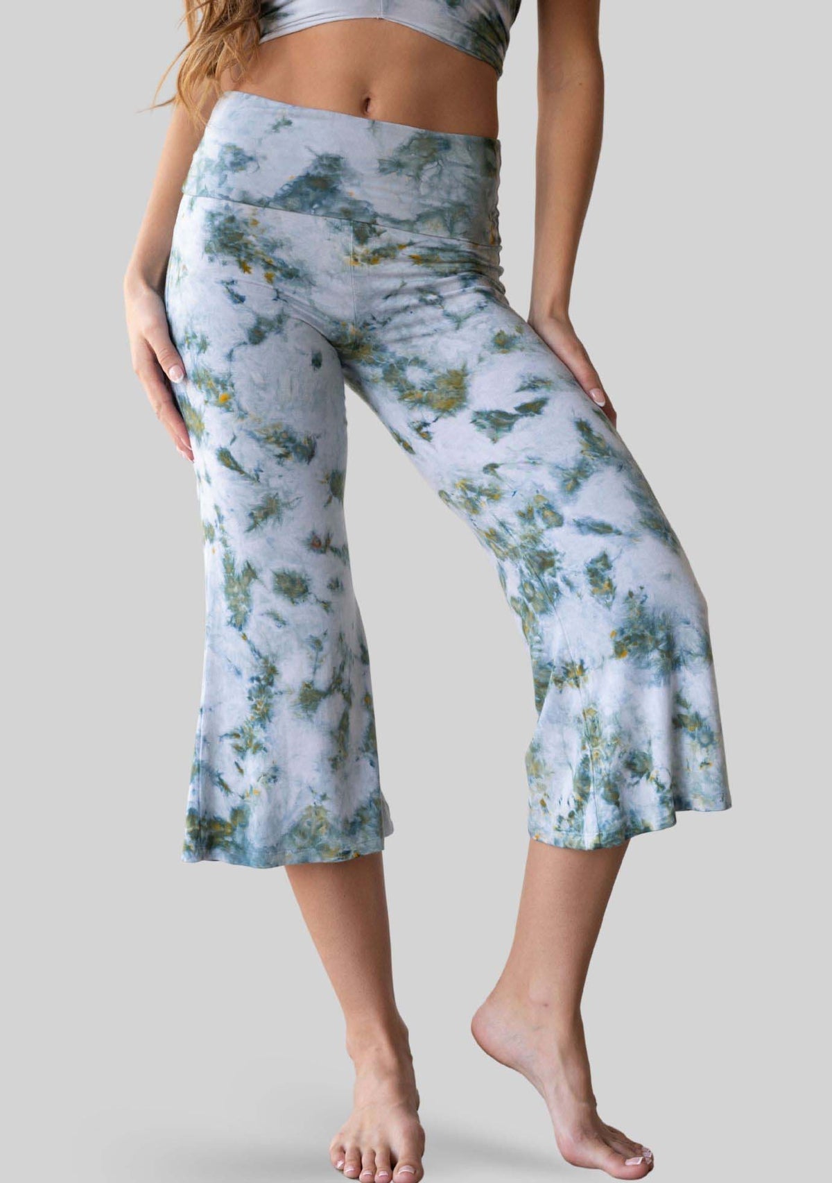 Jala Chill Yoga Capri in Seaweed - front view. [label] Athena is 5'9" XS