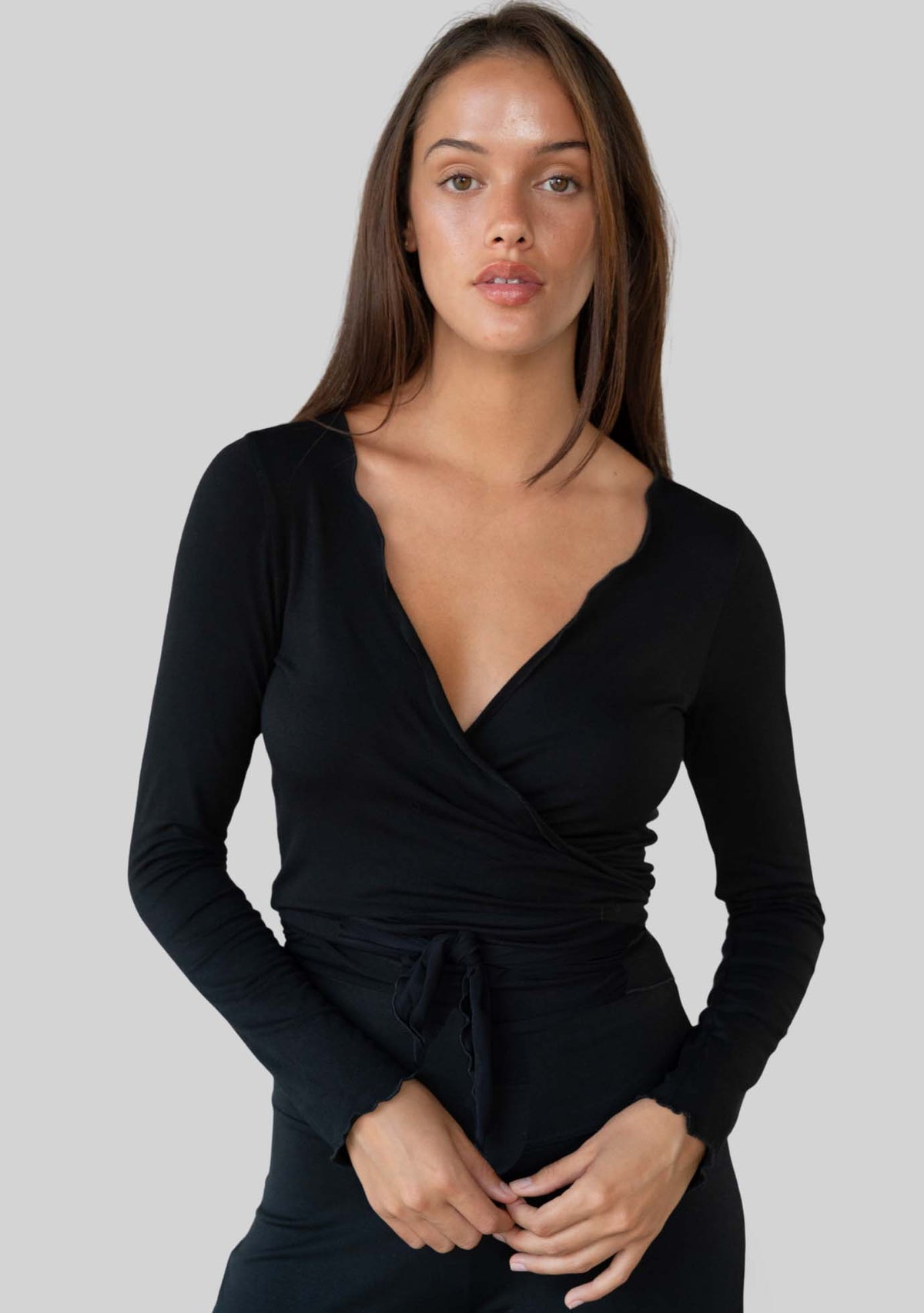 Jala Kira Wrap Top in Black - front view