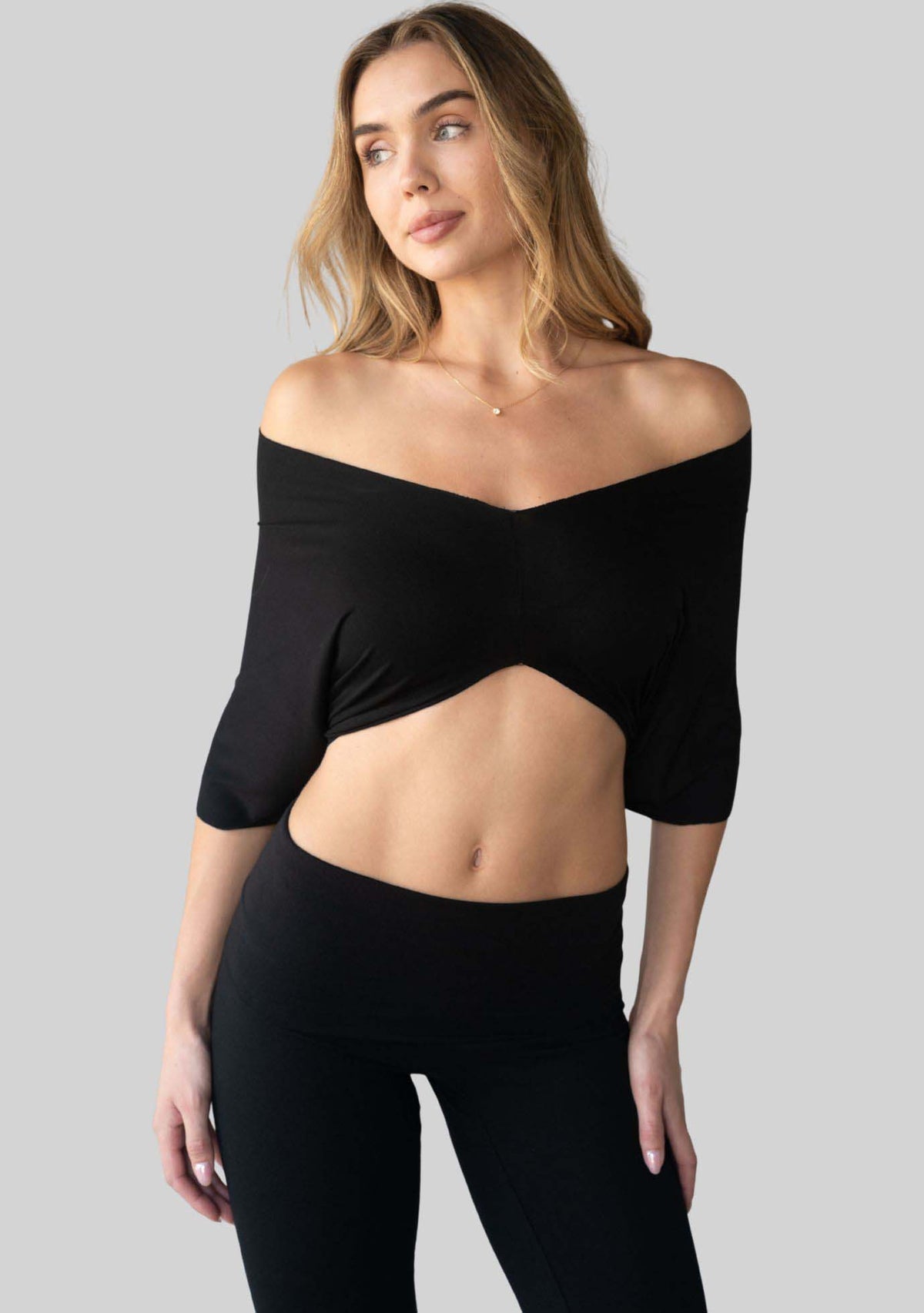 Jala Unwind Poncho in Black - off the shoulder style. [label] Off The Shoulder