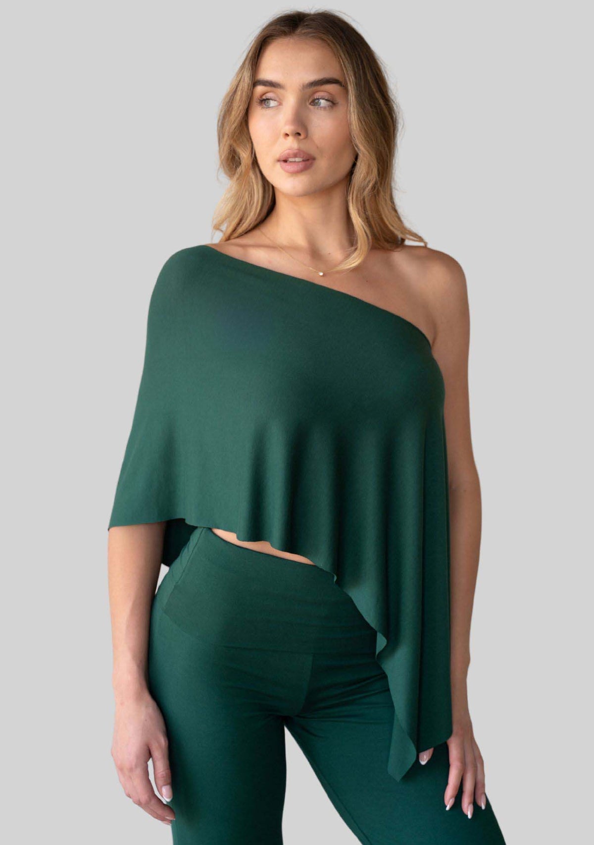 Evergreen Unwind Poncho, one shoulder style, front view. [label] One Shoulder