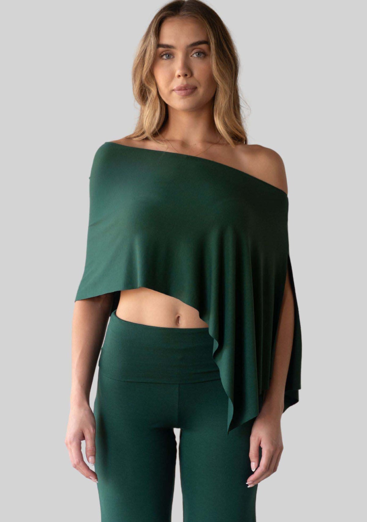Evergreen Unwind Poncho worn as a poncho, lifestyle photo. [label] Poncho