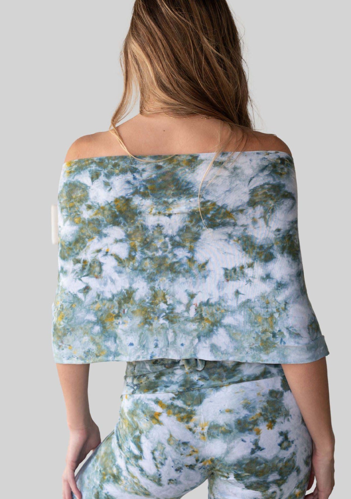 Jala Unwind Poncho in Seaweed - off the shoulder style, back view. 
